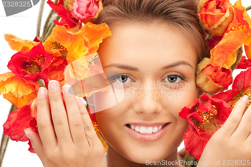 Image of lovely woman with red flowers