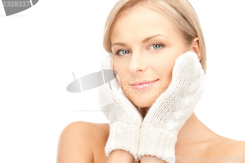 Image of beautiful woman in mittens