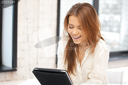 Image of happy woman with tablet pc computer