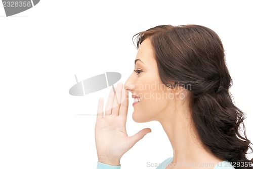 Image of woman whispering gossip