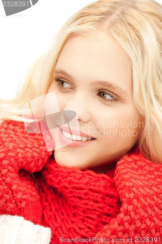 Image of beautiful woman in mittens
