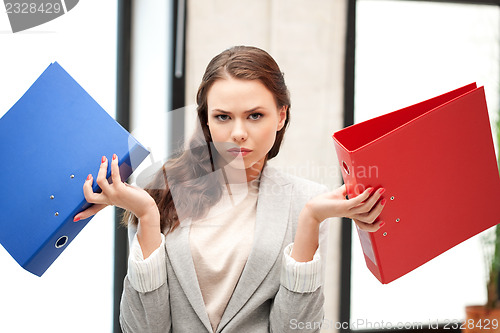 Image of woman with folders