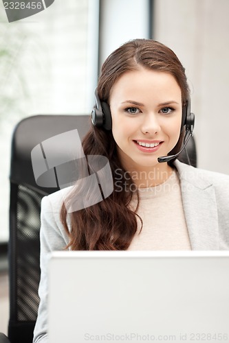 Image of helpline operator with laptop computer