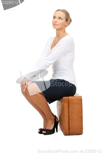 Image of lovely woman with suitcase