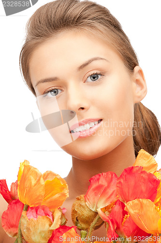 Image of lovely woman with red flowers
