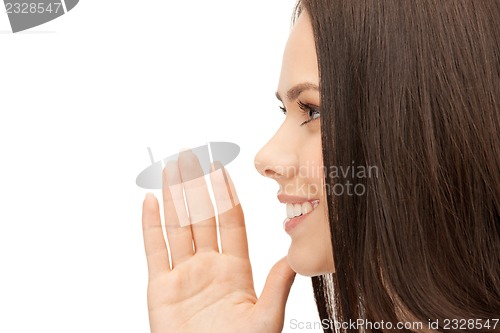 Image of woman whispering gossip