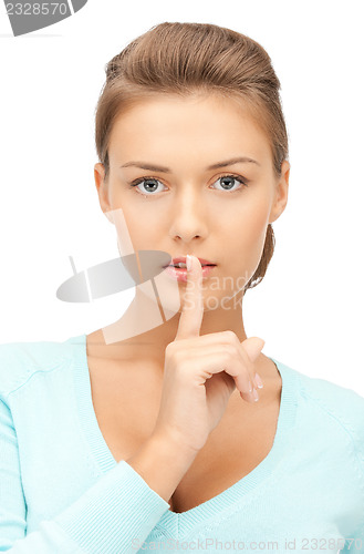 Image of finger on lips