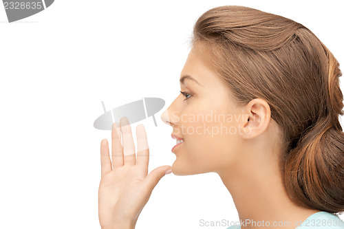 Image of woman whispering gossip