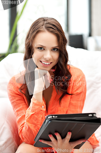 Image of happy woman with tablet pc computer