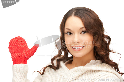 Image of beautiful woman in white sweater