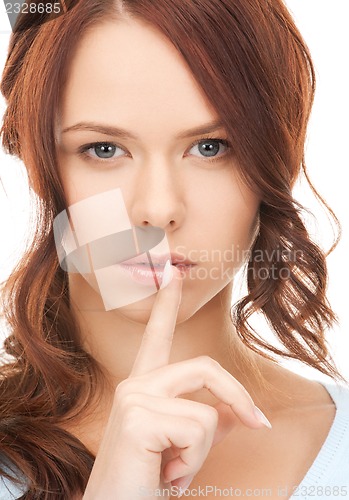 Image of finger on lips