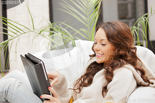 Image of happy woman with tablet pc computer
