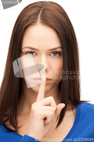 Image of finger on lips