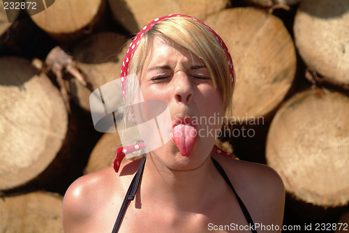 Image of women shows her tongue