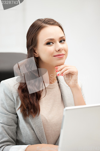 Image of happy woman with laptop computer