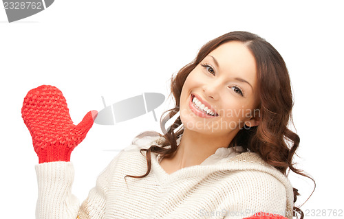 Image of beautiful woman in white sweater