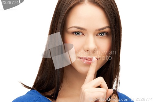 Image of finger on lips