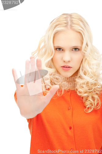 Image of woman making stop gesture