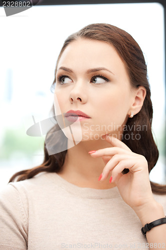 Image of calm and serious woman