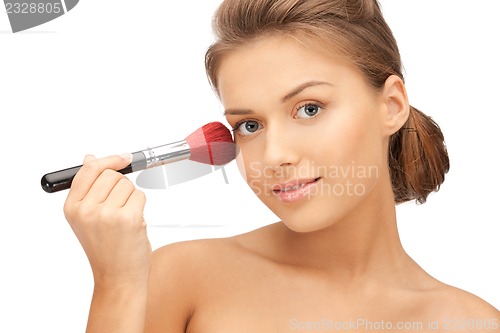 Image of beautiful woman with brush