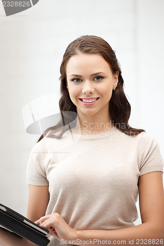 Image of happy woman with tablet pc computer