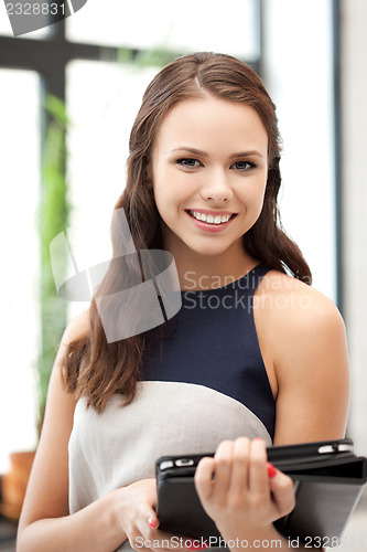 Image of happy woman with tablet pc computer