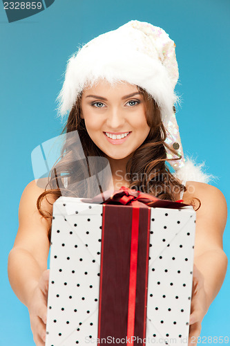 Image of santa helper girl with gift box