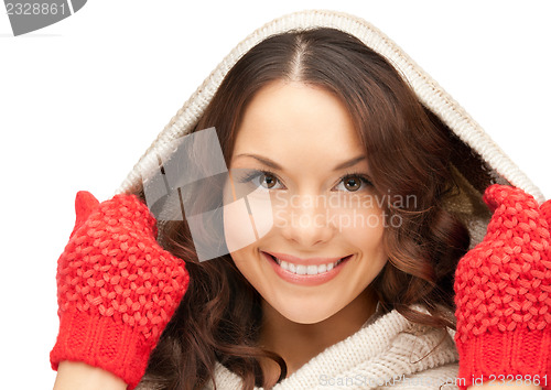Image of beautiful woman in white sweater