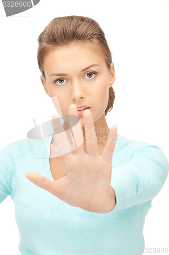 Image of woman making stop gesture