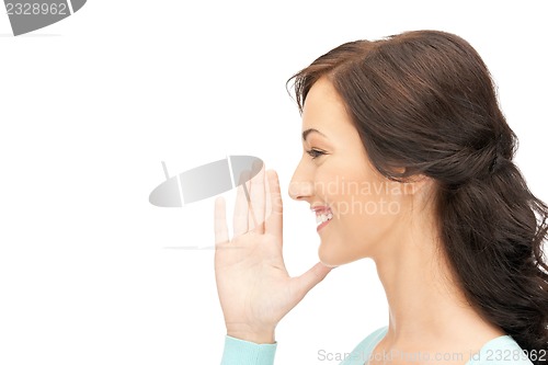 Image of woman whispering gossip