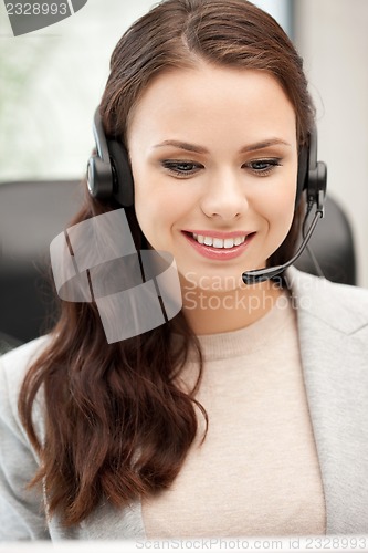 Image of helpline operator with laptop computer