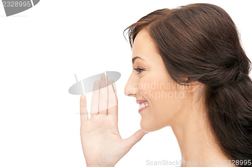 Image of woman whispering gossip