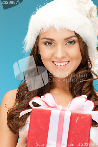 Image of santa helper girl with gift box