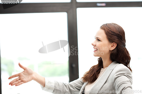 Image of woman with an open hand ready for handshake