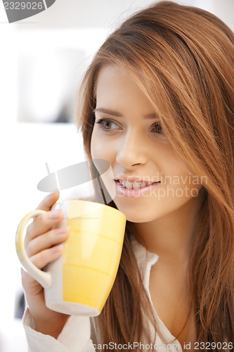 Image of lovely woman with mug