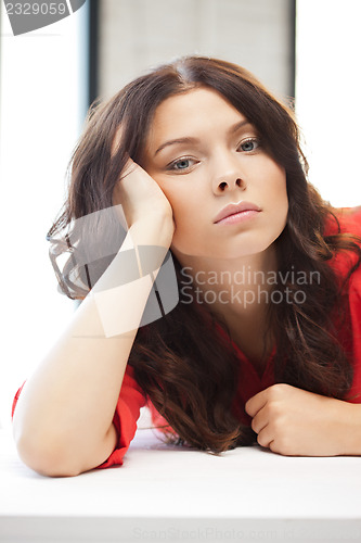 Image of calm and serious woman