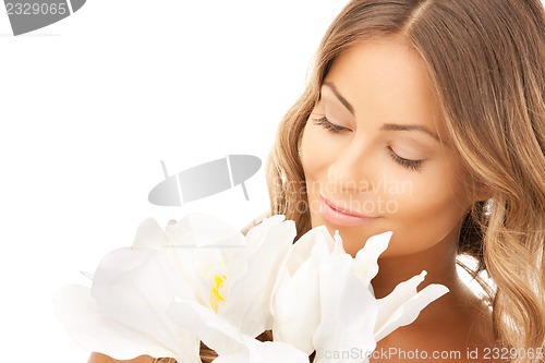 Image of beautiful woman with white flowers