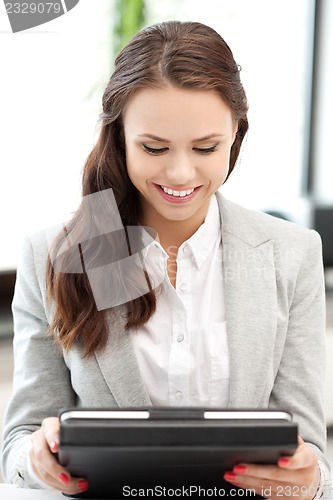 Image of happy woman with tablet pc computer