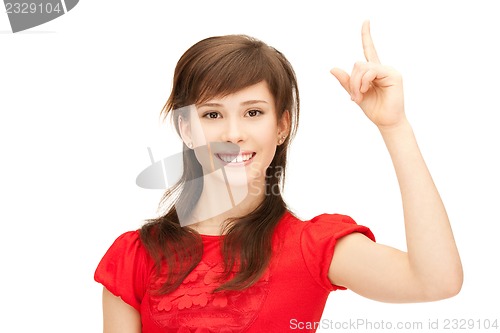 Image of teenage girl with her finger up