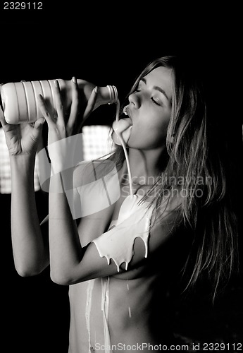 Image of woman with a bottle of milk