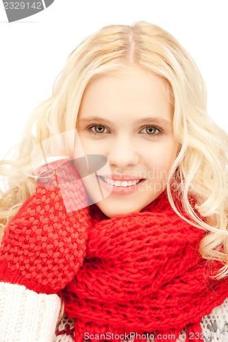 Image of beautiful woman in mittens