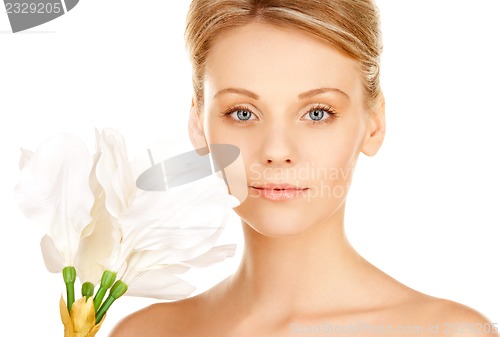 Image of beautiful woman with madonna lily