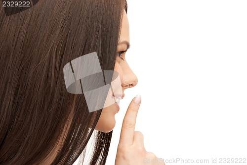 Image of finger on lips