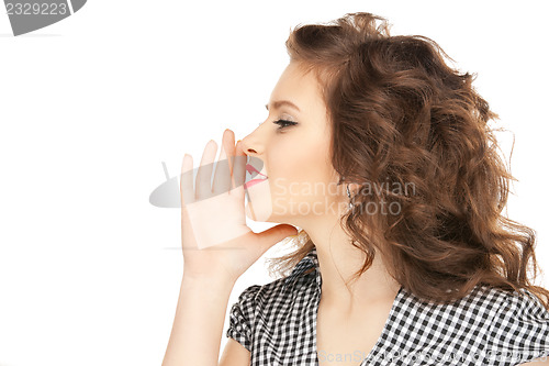 Image of woman whispering gossip