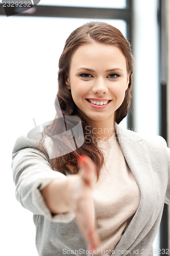 Image of woman with an open hand ready for handshake