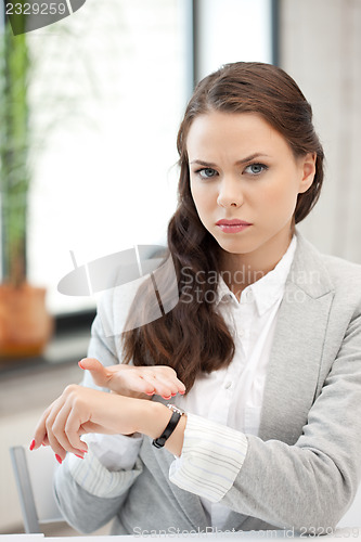 Image of businesswoman with watch