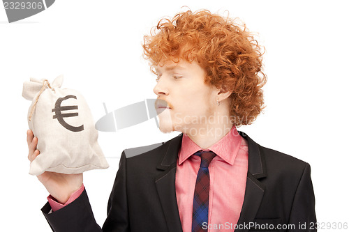 Image of man with euro signed bag