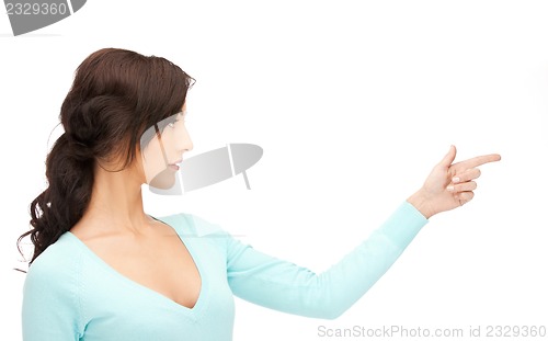 Image of businesswoman pointing her finger