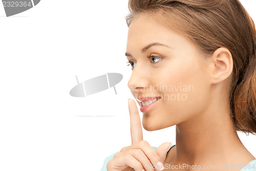 Image of finger on lips