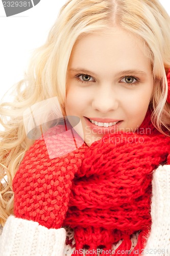 Image of beautiful woman in mittens